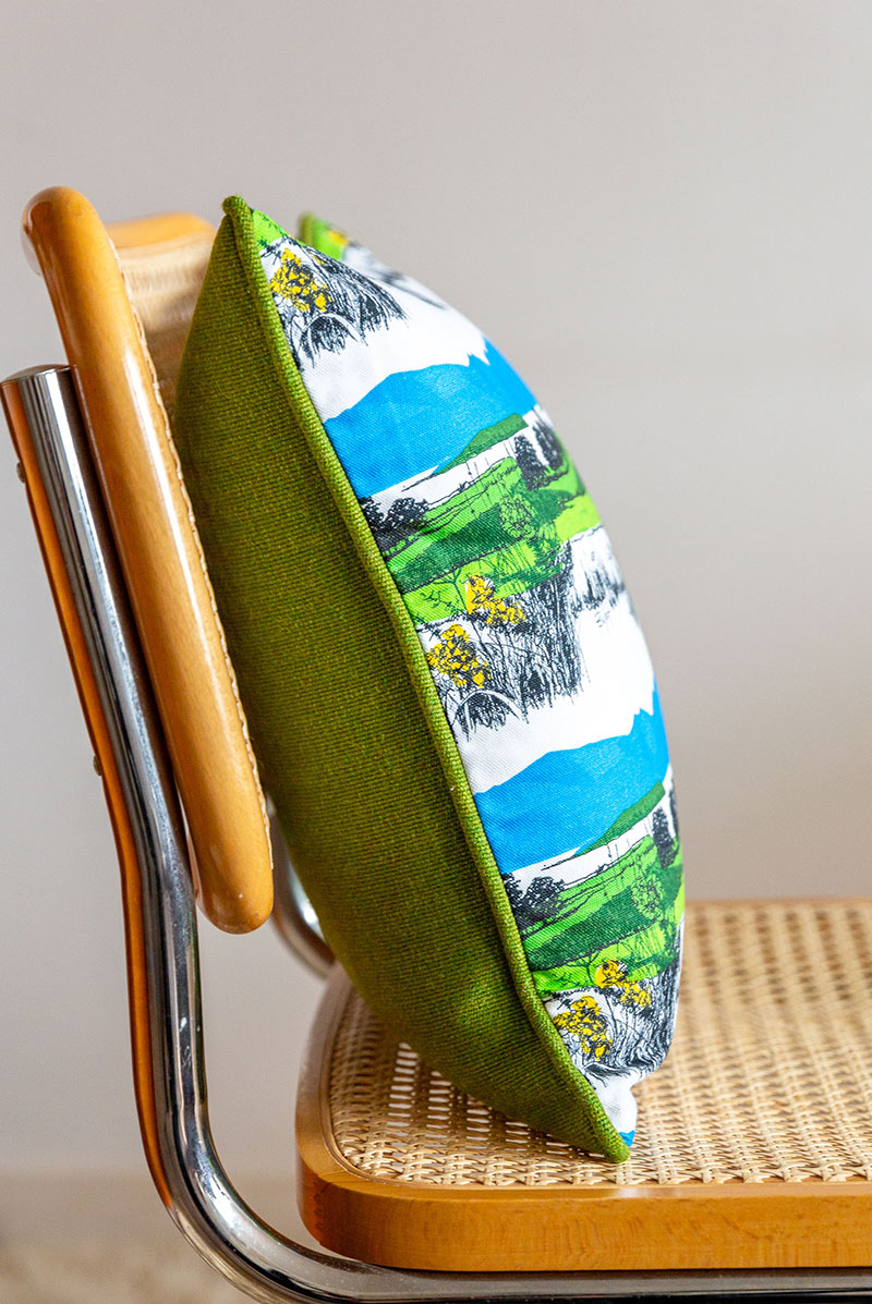 Sleeping Warrior cushion green blue with green by Sarah Jane Hemsley